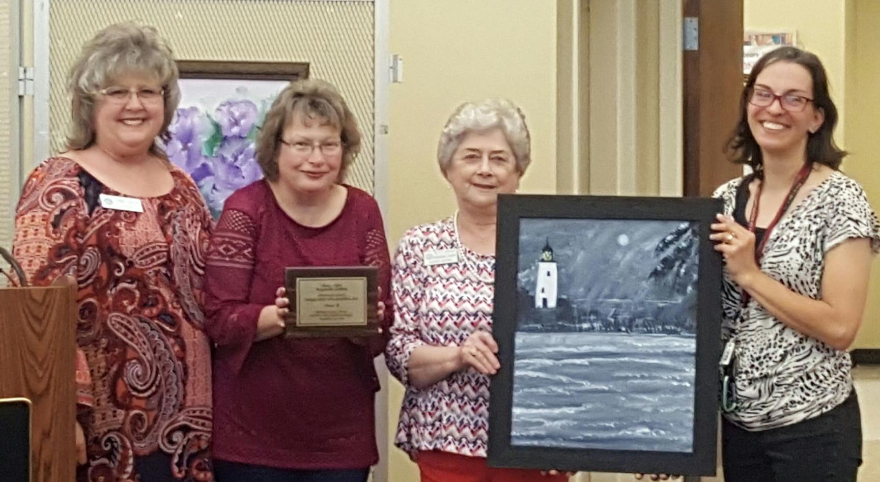 Grafton’s painting put on permanent display at library